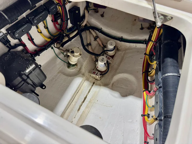 Slide: The Image of Engine compartment of 2020 Intrepid 407 Nomad FE with wiring and components visible. - 28