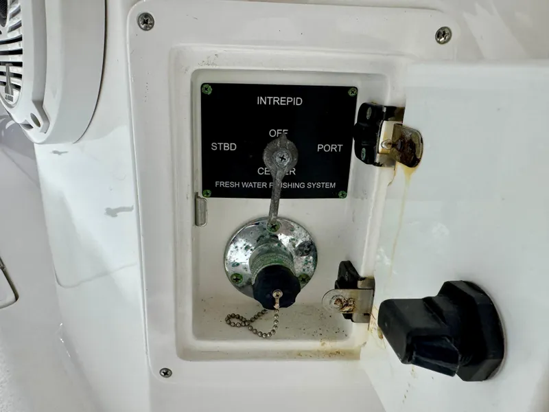 Slide: The Image of 2020 Intrepid 407 Nomad FE freshwater flushing system control panel. - 29