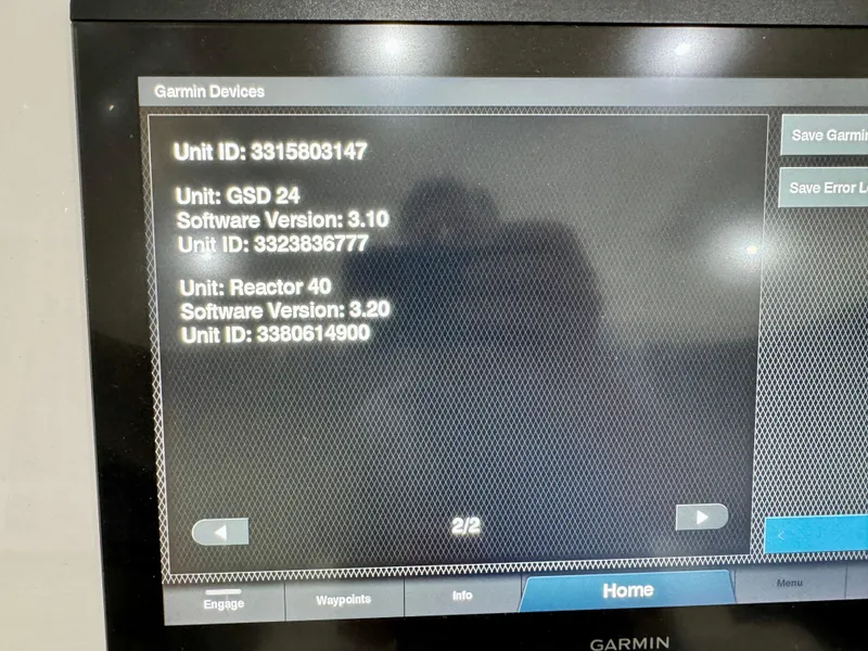 Slide: The Image of Garmin device screen displaying unit IDs and software versions on Intrepid 407 Nomad FE, 2020. - 35
