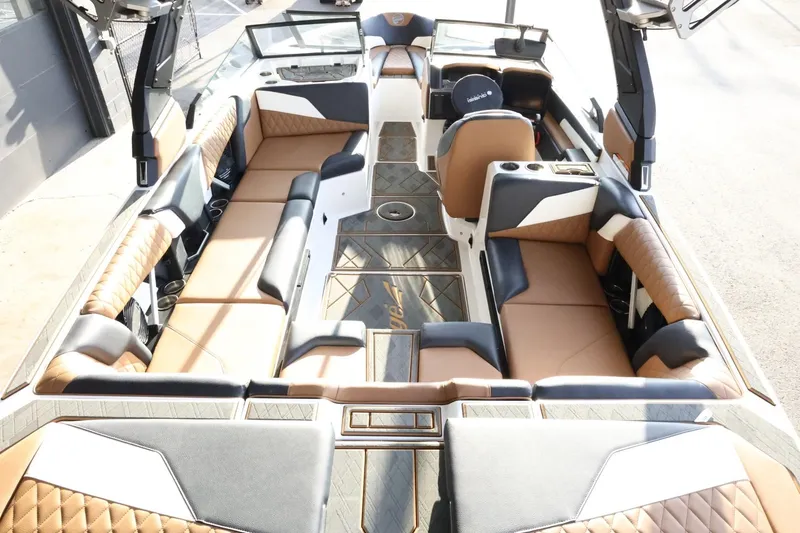 Slide: The Image of 2025 Tigé Z3 boat interior with luxurious seating and modern design features. - 12