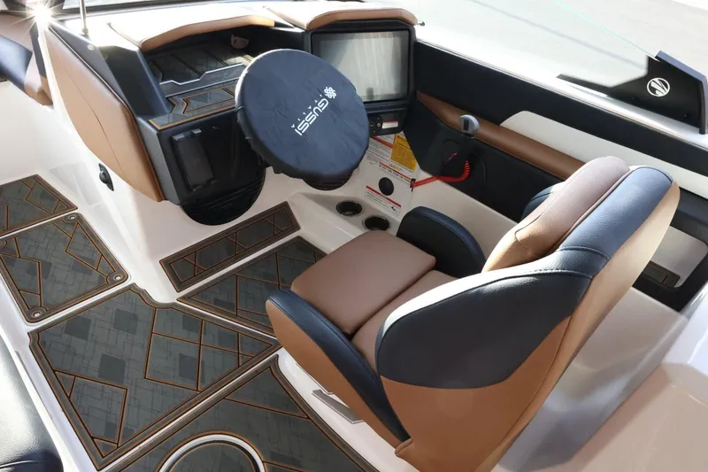 Slide: The Image of 2025 Tigé Z3 boat interior with modern dashboard and luxurious seating. - 16
