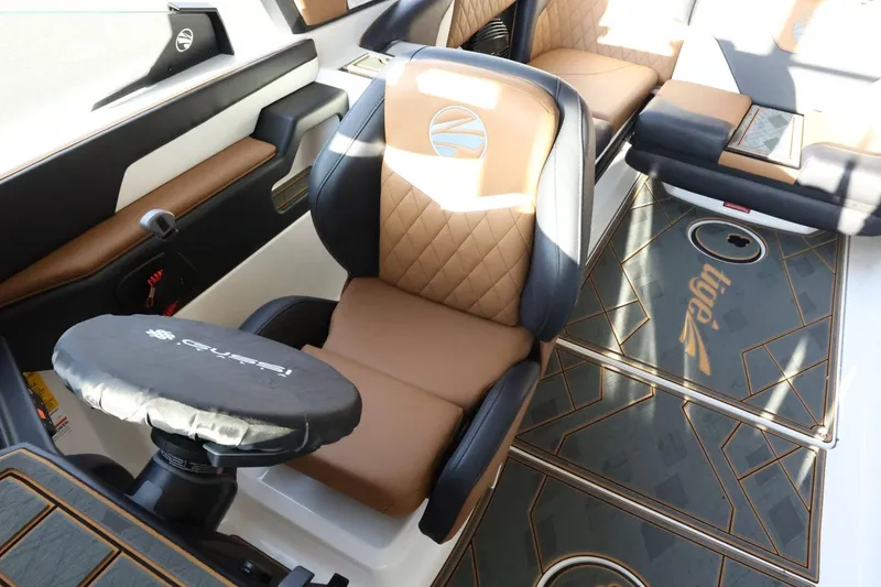 Slide: The Image of 2025 Tigé Z3 boat interior with luxurious seating and modern design. - 22