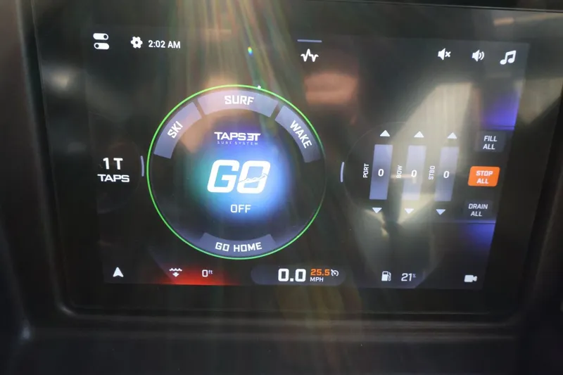 Slide: The Image of 2025 Tigé Z3 dashboard display showing TAPSET controls and speedometer. - 28