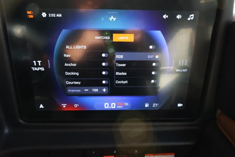 Slide: The Image of Touchscreen control panel in a 2025 Tigé Z3 boat, displaying lighting and settings options. - 29