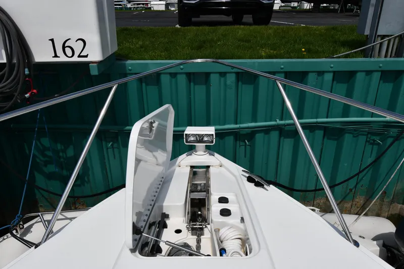 Slide: The Image of 2009 Formula 40 PC boat bow with anchor system and railing, docked at slip 162. - 2