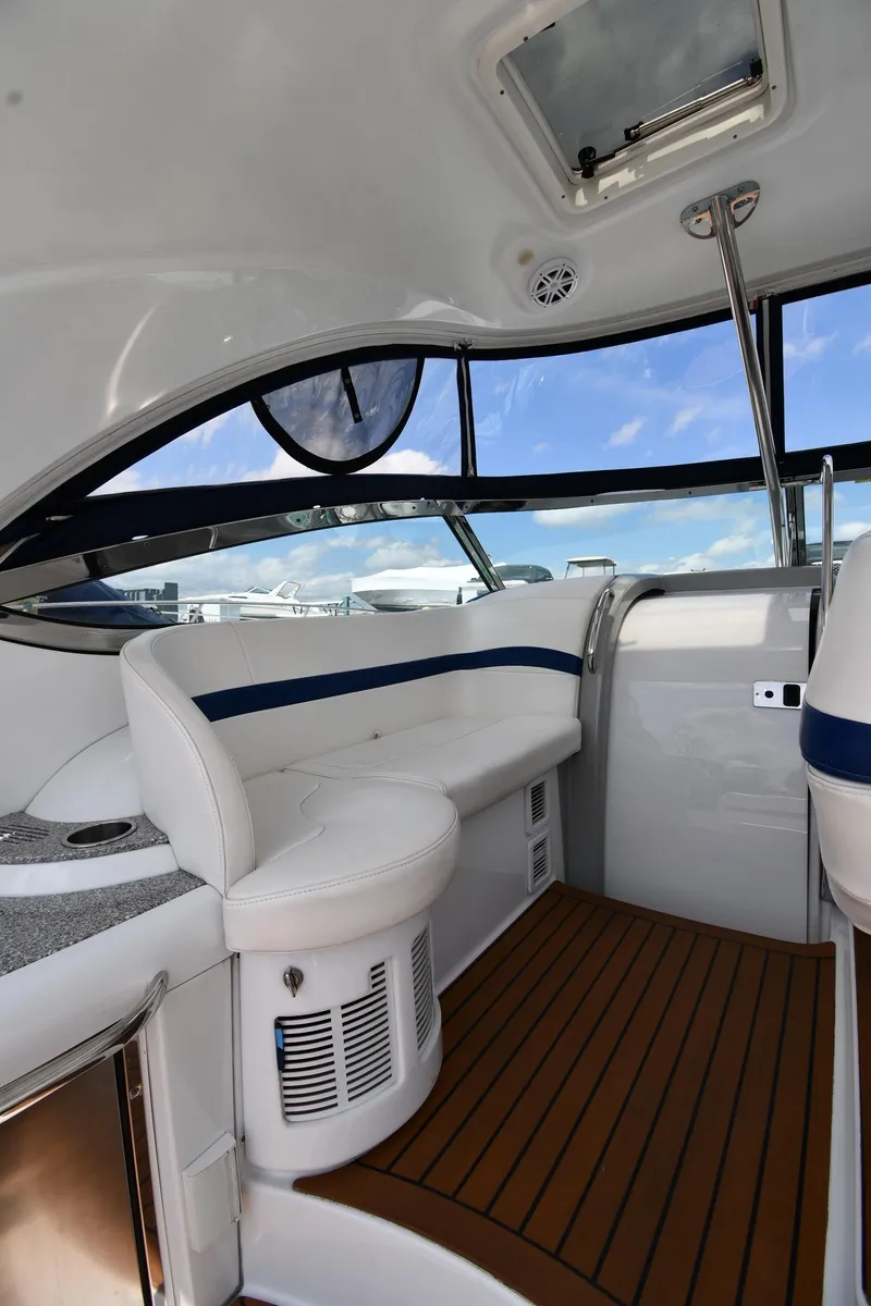 Slide: The Image of 2009 Formula 40 PC yacht interior with sleek seating and wooden flooring. - 20
