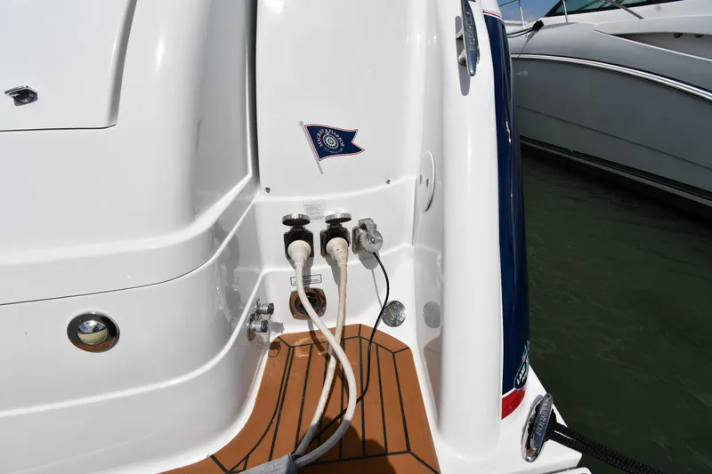 Slide: The Image of 2009 Formula 40 PC yacht stern with power connections and teak decking. - 31