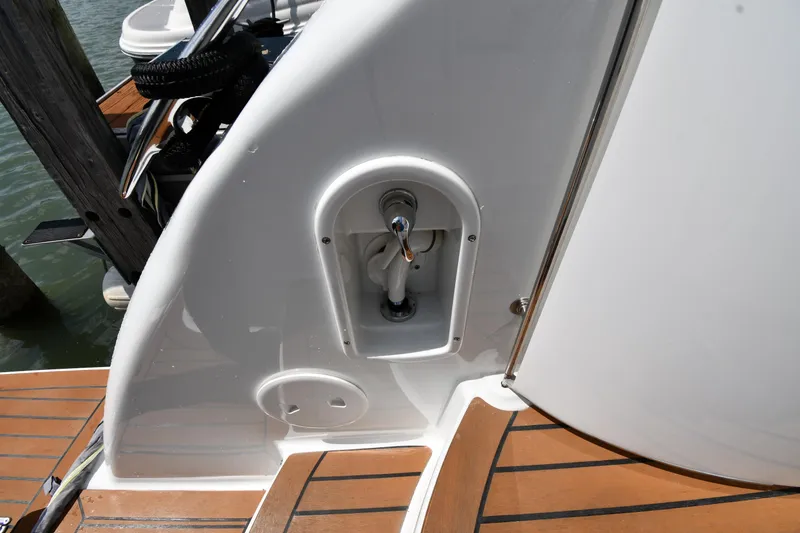Slide: The Image of 2009 Formula 40 PC yacht deck detail with water hose connection. - 32