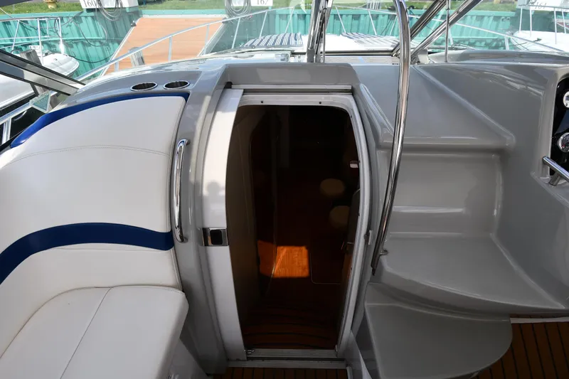 Slide: The Image of 2009 Formula 40 PC yacht interior entrance with seating and steps. - 33