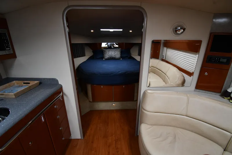Slide: The Image of Interior of 2009 Formula 40 PC yacht with cozy bedroom and modern amenities. - 34