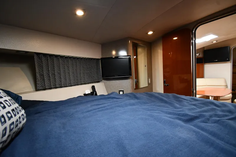 Slide: The Image of Interior cabin of 2009 Formula 40 PC yacht with bed, TV, and seating area. - 39