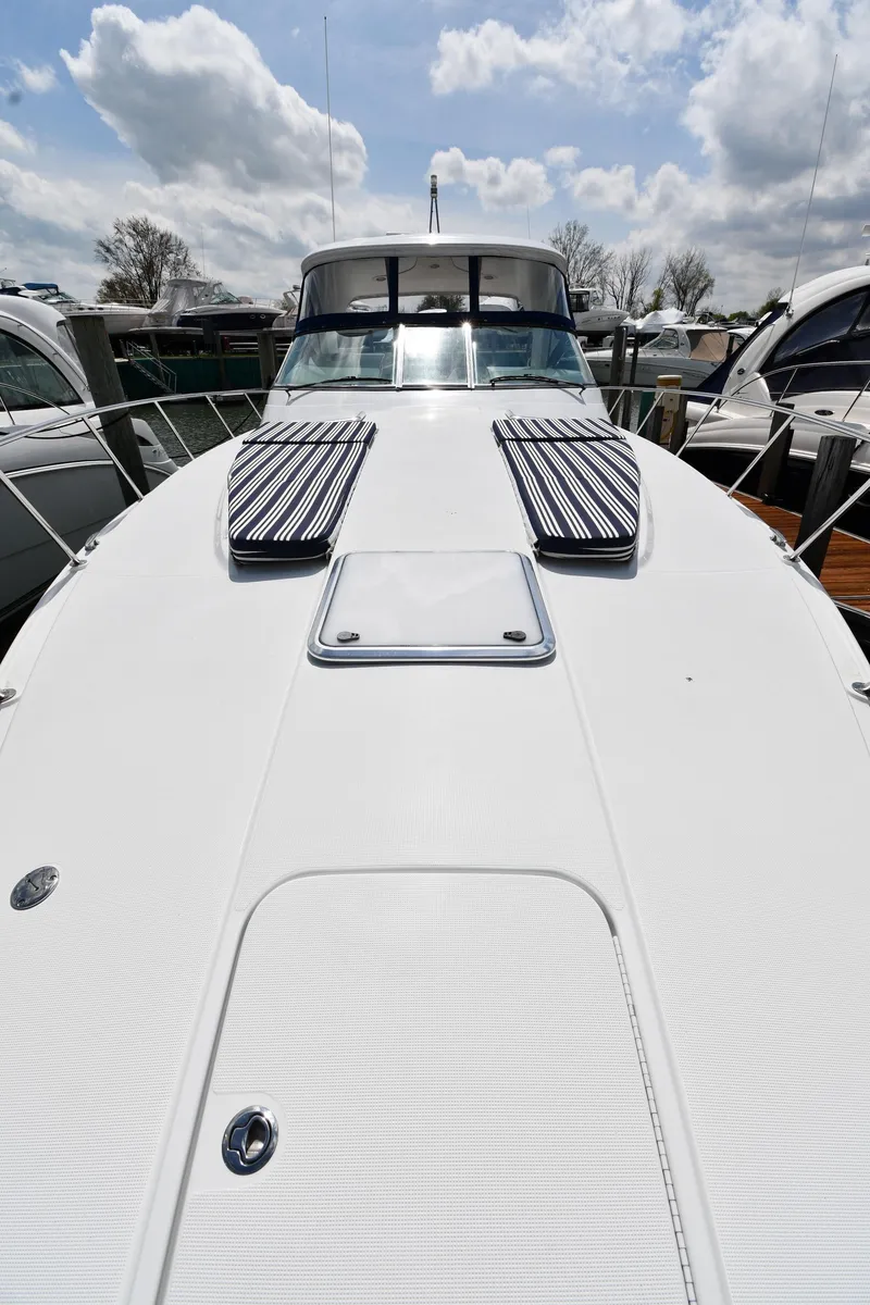 Slide: The Image of 2009 Formula 40 PC yacht deck under a partly cloudy sky. - 4