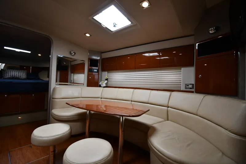 Slide: The Image of Luxurious interior of a 2009 Formula 40 PC yacht with leather seating and wooden accents. - 40
