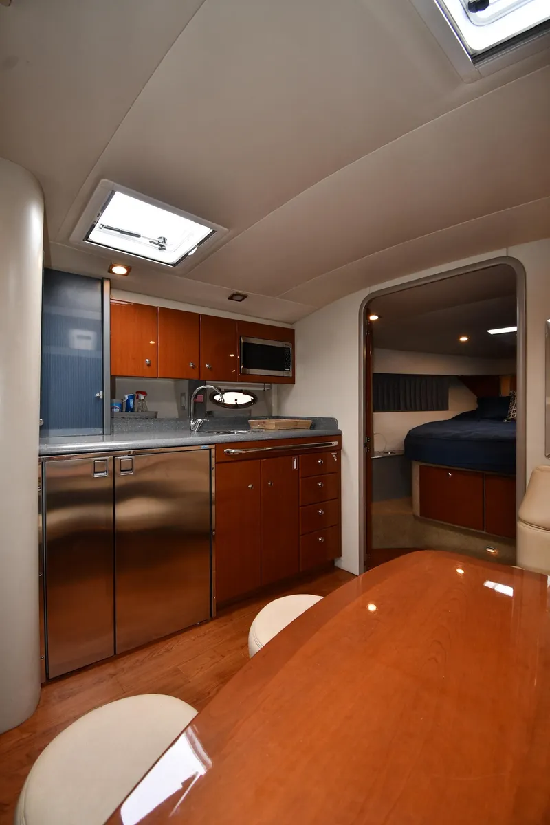 Slide: The Image of Interior of 2009 Formula 40 PC yacht with modern kitchen and cozy cabin. - 43