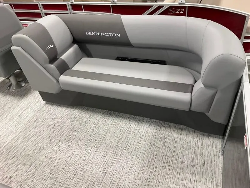 Slide: The Image of 2025 Bennington 23SSR-SPS (PB) boat seating, featuring sleek gray upholstery and modern design. - 10