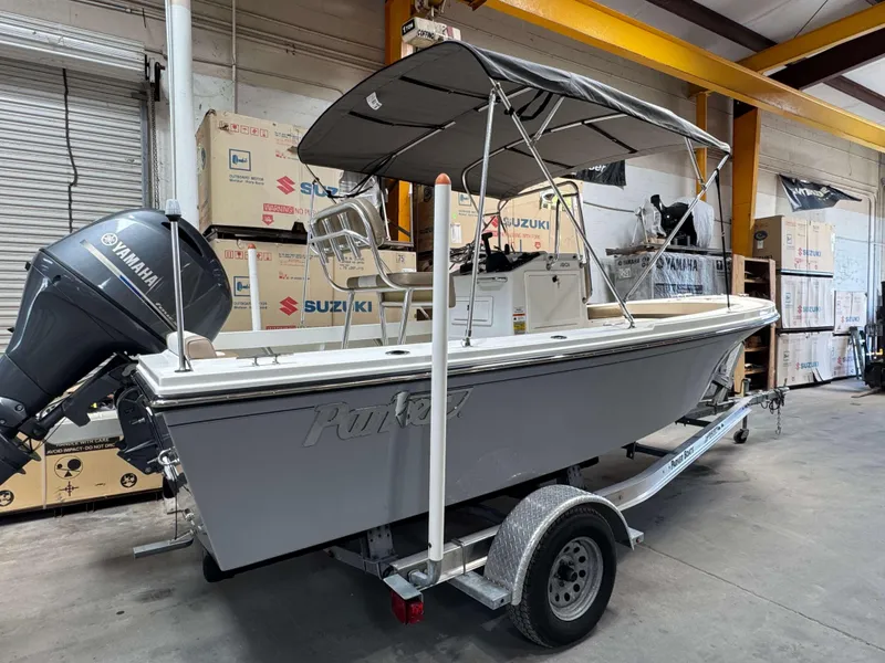 Slide: The Image of 2019 Parker 1801 CC boat with Yamaha engine on trailer in warehouse. - 3