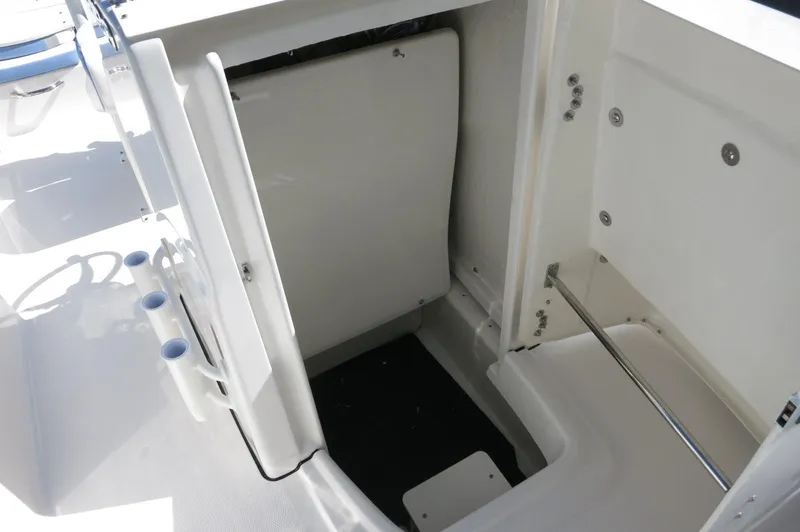 Slide: The Image of 2025 Robalo R180 Center Console boat storage compartment, open and spacious design. - 26