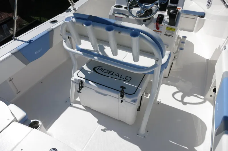 Slide: The Image of 2025 Robalo R180 Center Console boat interior with seating and storage. - 31