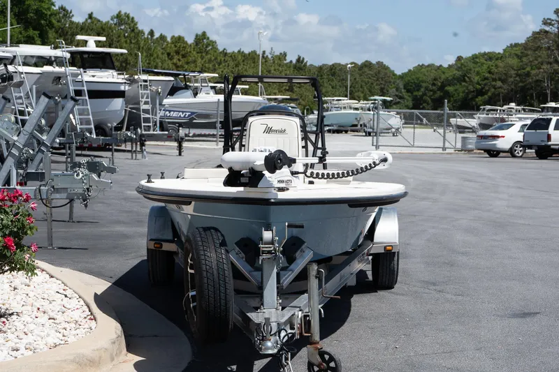 Slide: The Image of 2023 Maverick 18 HPX-V boat on trailer in marina parking lot. - 12
