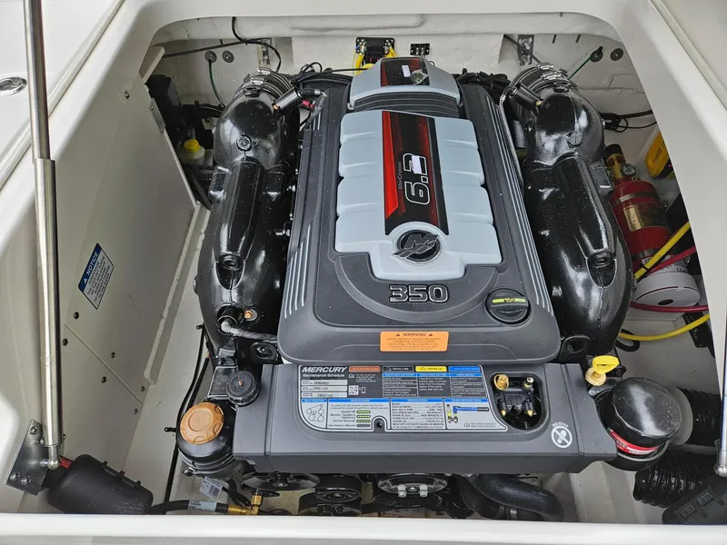 Slide: The Image of 2025 Chaparral 247 SSX engine compartment featuring a powerful 6.2L 350 HP engine. - 41