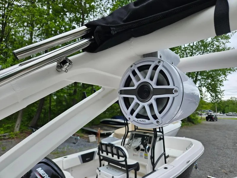 Slide: The Image of 2025 Chaparral 247 SSX boat with JL Audio speaker, outdoor setting. - 47