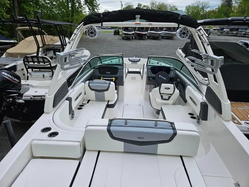 Slide: The Image of 2025 Chaparral 247 SSX boat interior with sleek seating and modern design. - 6