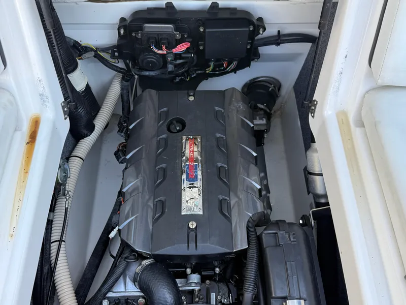 Slide: The Image of 2015 Yamaha Boats SX192 engine compartment, showcasing the powerful engine and components. - 12