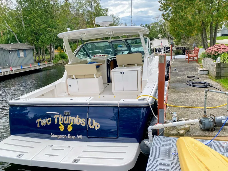 Slide: The Image of 2005 Tiara Yachts 32 Open docked in Sturgeon Bay, WI, named "Two Thumbs Up." - 1