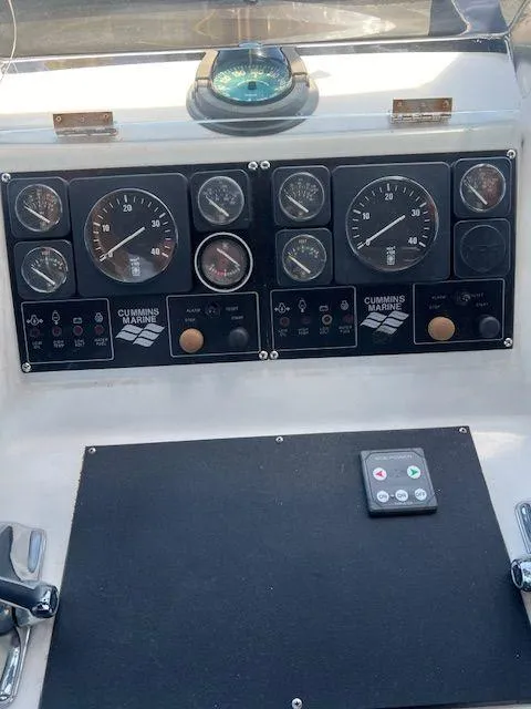 Slide: The Image of Control panel of a 1990 Jefferson 42 Viscount Sundeck boat with Cummins gauges. - 21