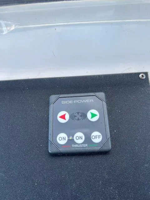 Slide: The Image of Control panel for thruster on 1990 Jefferson 42 Viscount Sundeck boat. - 23