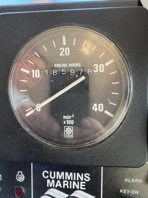 Slide: The Image of Engine hour meter showing 18,597.8 hours on a 1990 Jefferson 42 Viscount Sundeck. - 26