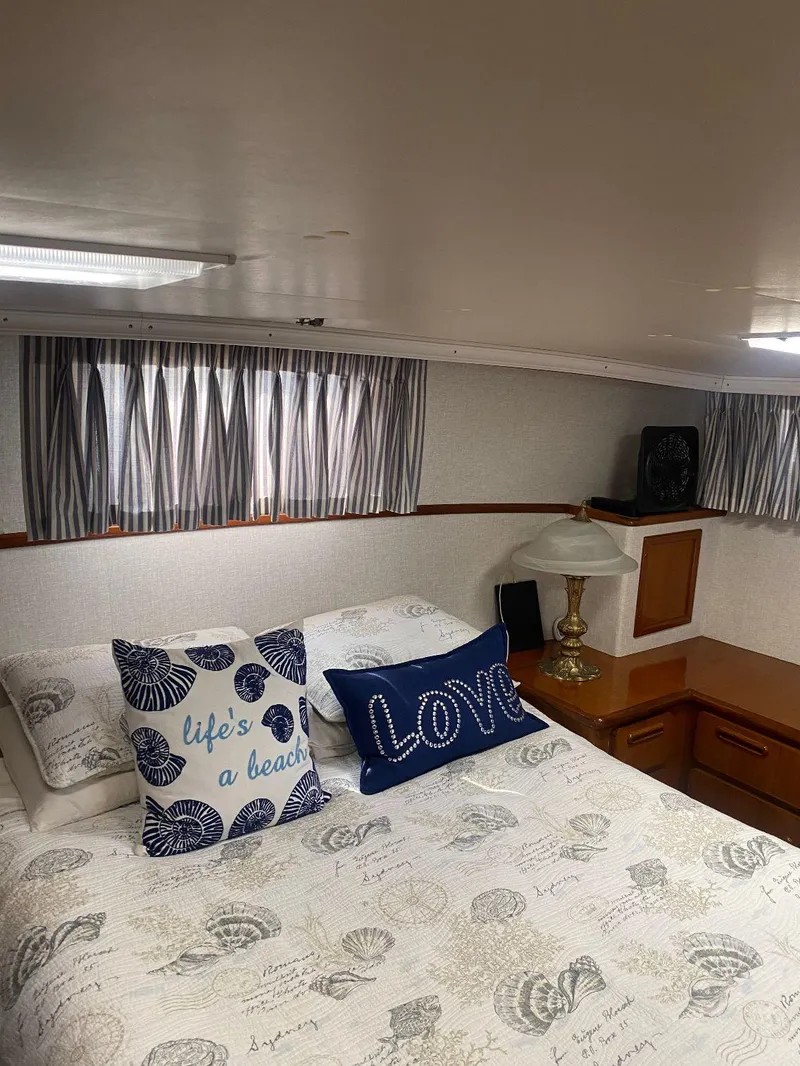 Slide: The Image of Cozy bedroom in 1990 Jefferson 42 Viscount Sundeck with nautical-themed decor. - 47