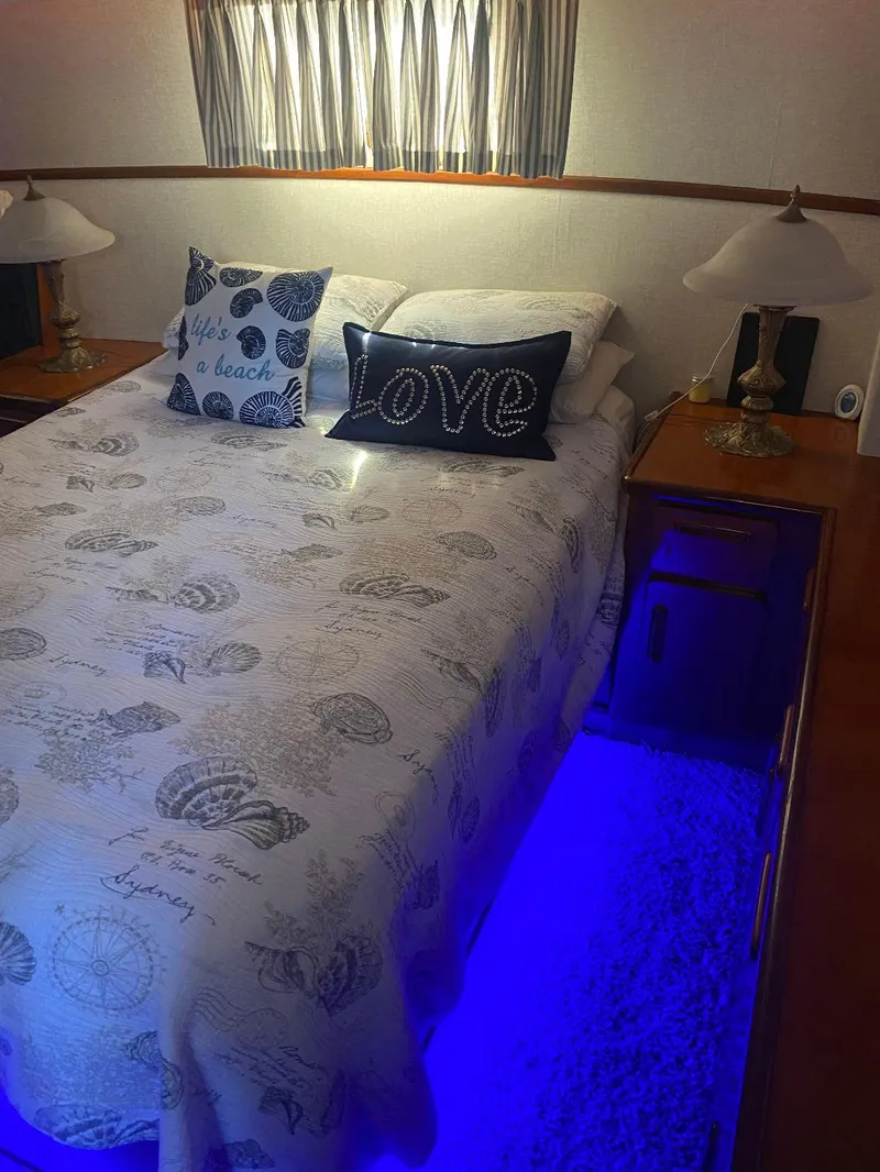 Slide: The Image of Cozy bedroom in 1990 Jefferson 42 Viscount Sundeck with nautical decor and ambient lighting. - 48