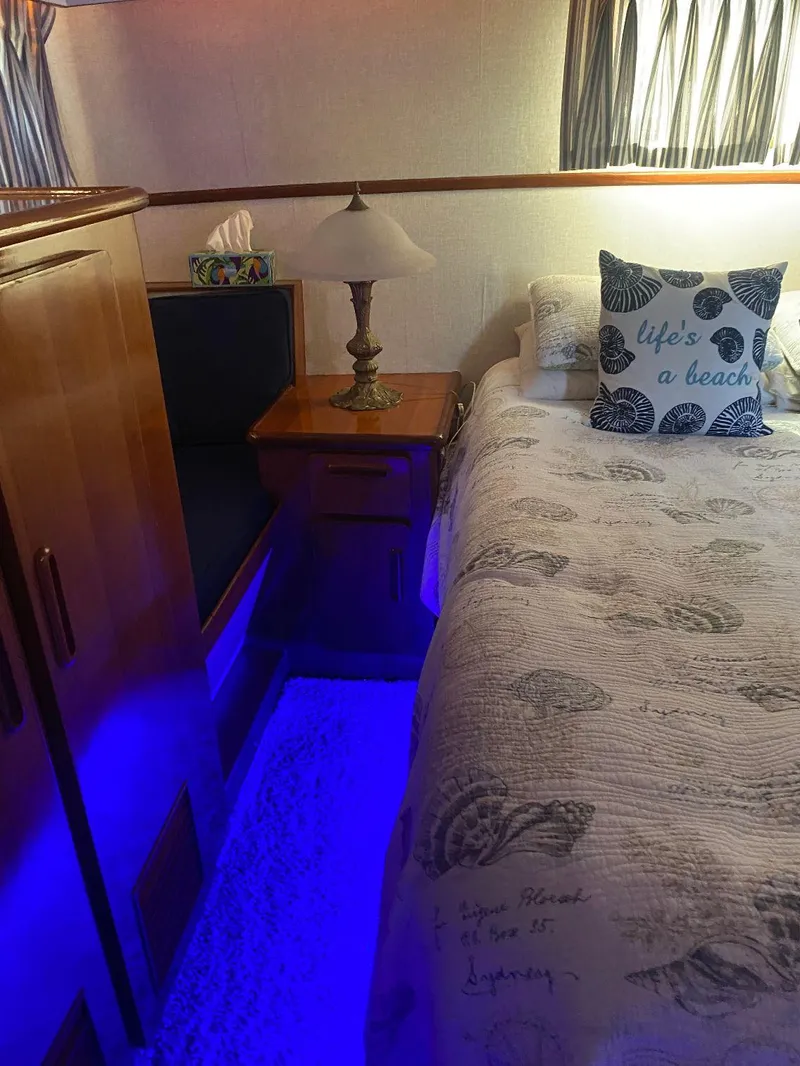 Slide: The Image of Cozy bedroom in 1990 Jefferson 42 Viscount Sundeck with blue lighting and nautical decor. - 49