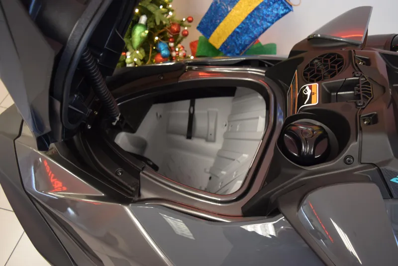 Slide: The Image of 2024 Sea-Doo GTR 230 storage compartment open, showcasing interior space. - 8