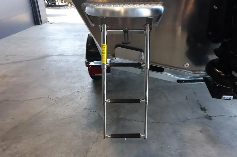 Slide: The Image of 2025 Thunder Jet 209 Rush OT boat ladder on concrete floor. - 10