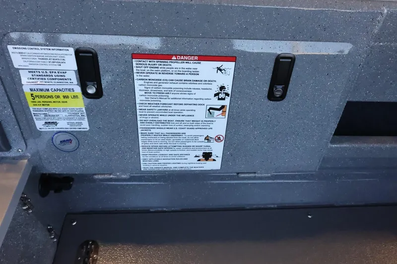 Slide: The Image of Interior warning labels on 2025 Thunder Jet 209 Rush OT boat, emphasizing safety and capacity limits. - 12