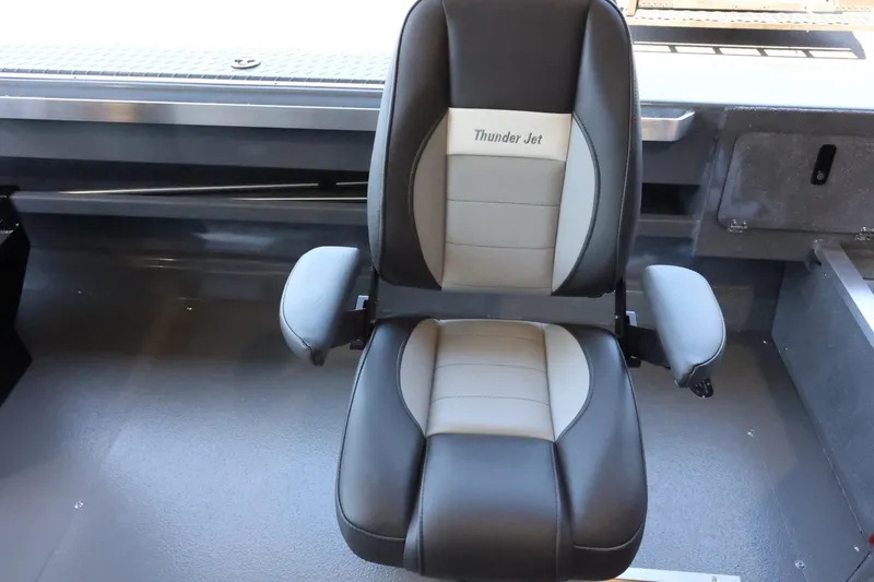 Slide: The Image of 2025 Thunder Jet 209 Rush OT boat seat, black and gray design, comfortable armrests. - 14