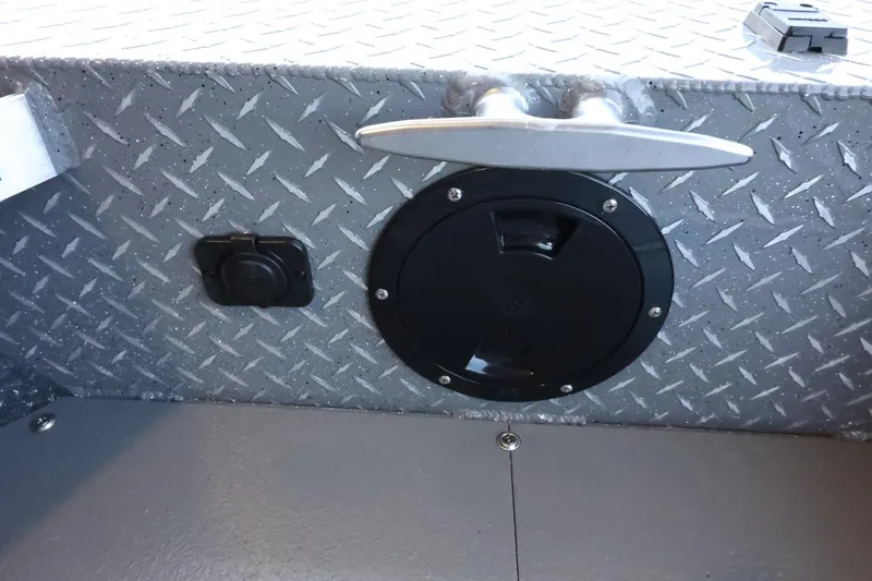 Slide: The Image of 2025 Thunder Jet 209 Rush OT boat interior with diamond plate finish and cleat. - 19