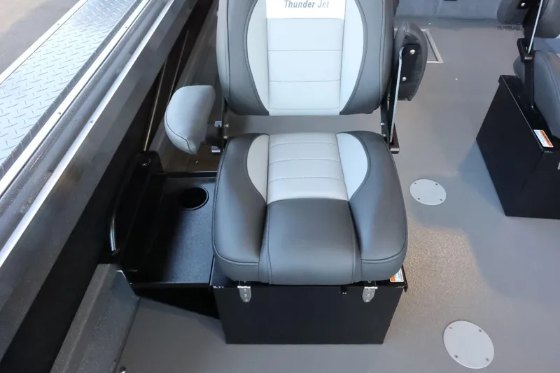 Slide: The Image of 2025 Thunder Jet 209 Rush OT boat seat with armrest and cup holder. - 22