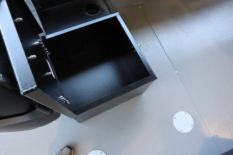 Slide: The Image of Interior storage compartment of 2025 Thunder Jet 209 Rush OT boat. - 23