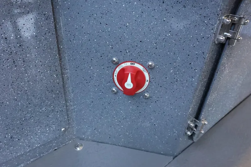 Slide: The Image of Red switch on Thunder Jet 209 Rush OT boat, 2025 model, against speckled gray surface. - 34