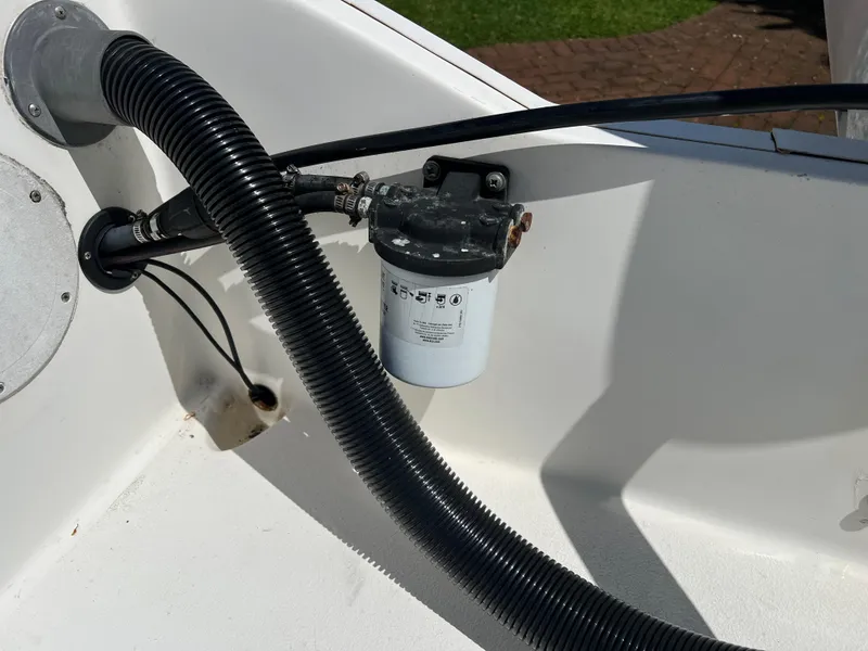 Slide: The Image of Fuel filter system in a 2001 Aquasport 200 Osprey boat. - 16