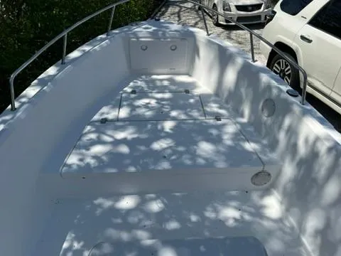 Slide: The Image of 2001 Aquasport 200 Osprey boat interior with sunlight and shadows. - 6