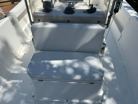 Slide: The Image of 2001 Aquasport 200 Osprey boat interior with white seating and console. - 8