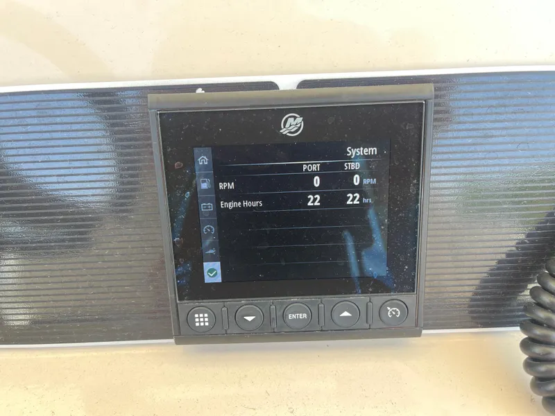 Slide: The Image of Dashboard display of a 2022 Boston Whaler 270 Dauntless showing engine hours and RPM. - 23