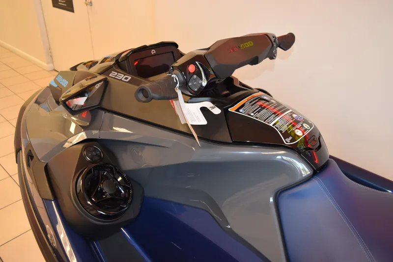 Slide: The Image of 2024 Sea-Doo GTX 230 jet ski, close-up of handlebars and controls. - 6