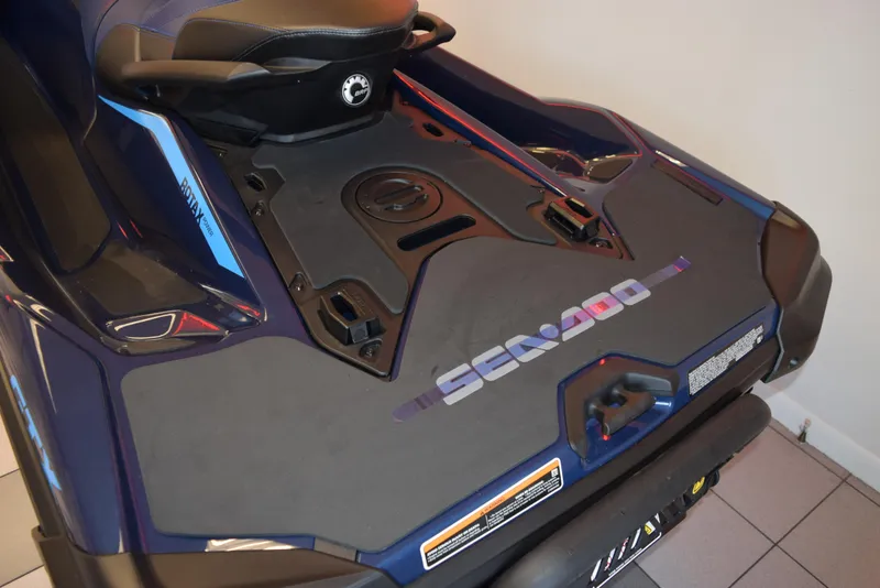 Slide: The Image of 2024 Sea-Doo GTX 300, rear view, showcasing sleek design and branding. - 10