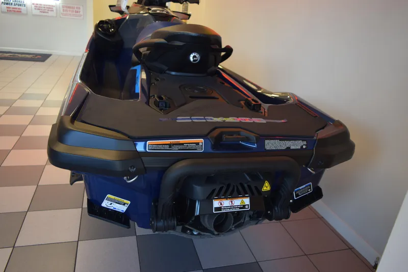 Slide: The Image of 2024 Sea-Doo GTX 300 jet ski, rear view, displayed indoors on tiled floor. - 5