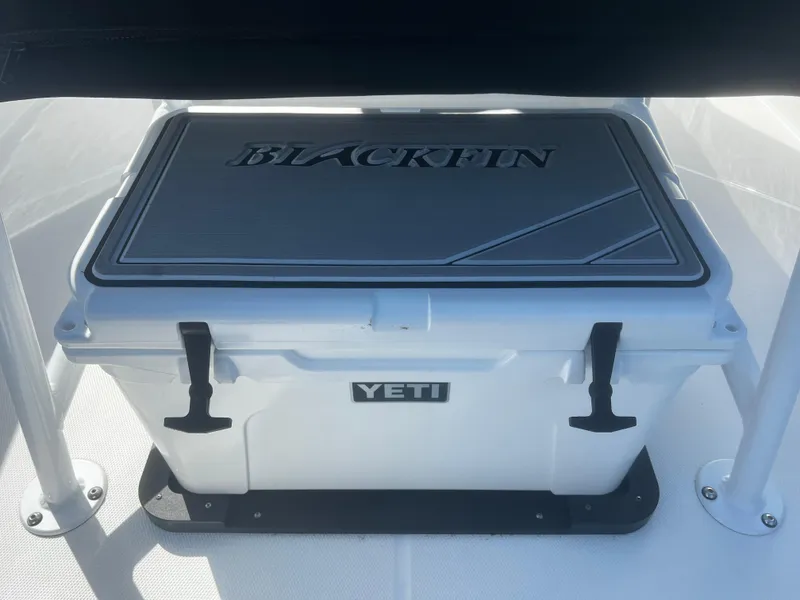 Slide: The Image of 2022 Blackfin 222 CC boat with Yeti cooler on deck. - 15